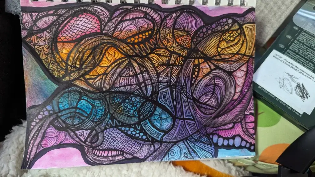 Vibrant abstract doodle with intricate patterns and colors.